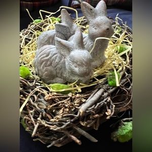 Three little bunnies nesting in a centerpiece